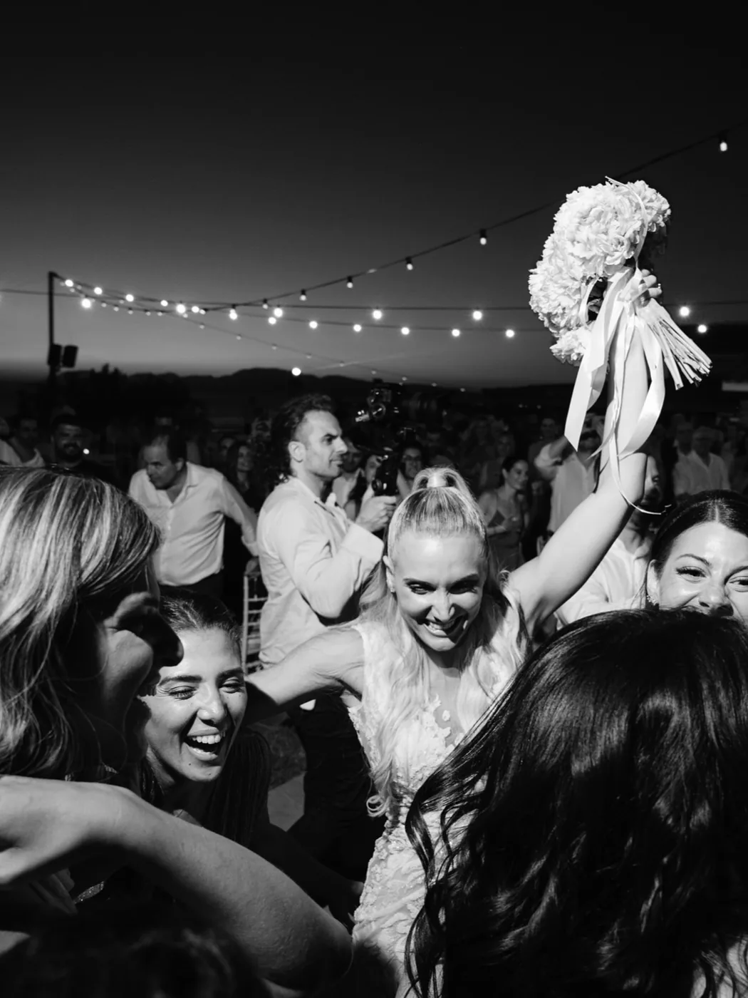 The dance floor under string lights